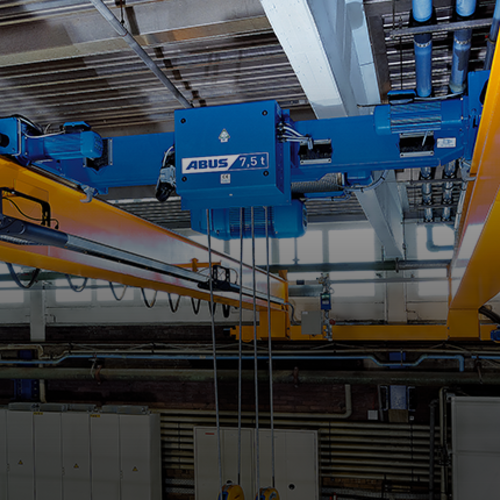 Carrello birotaia ABUS modello DA per ingombro ridotto e portata fino a 40 t negli impianti gru.